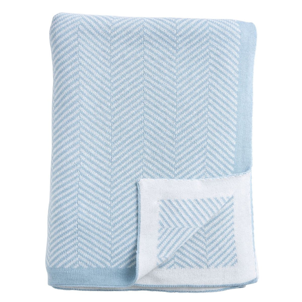Twig and Feather herringbone cotton know throw rug in  sky blue by Paloma Living