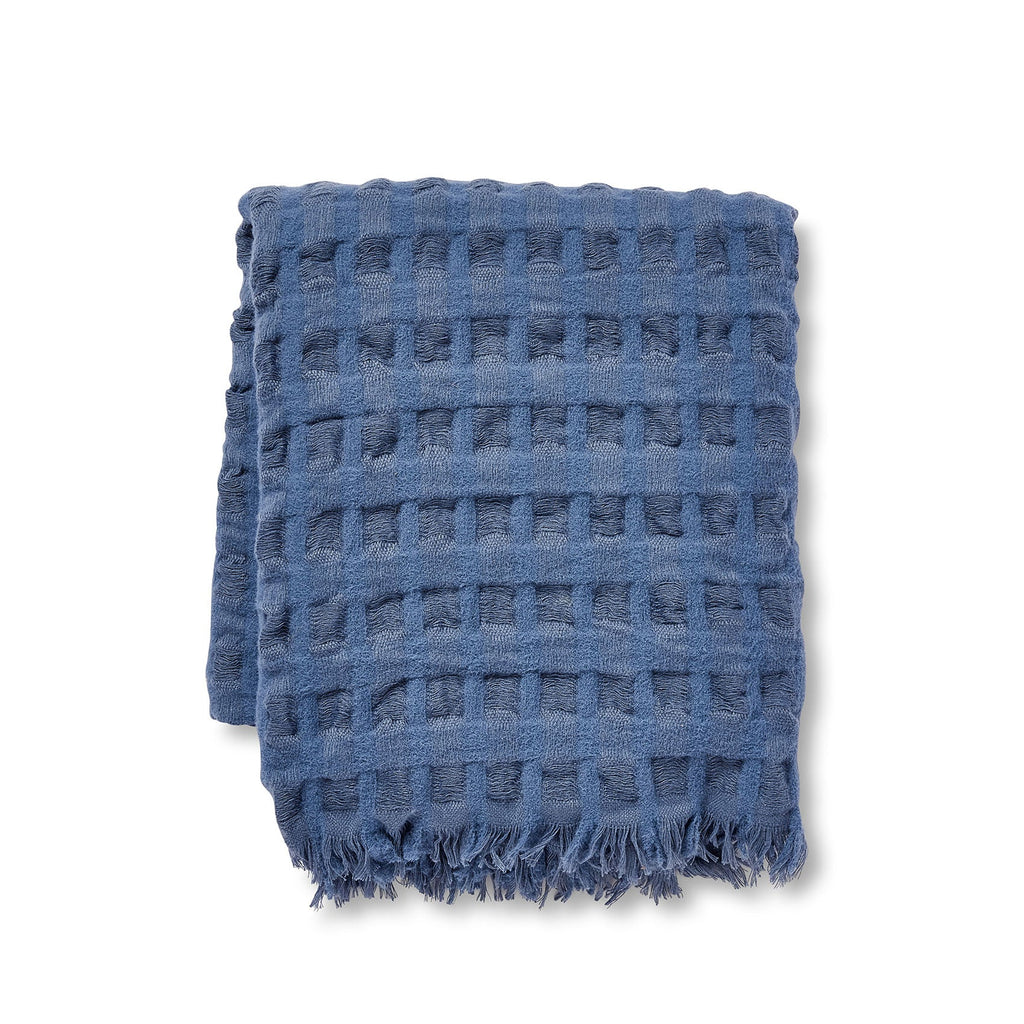 Twig and Feather waffle weave throw rug in washed blue by Madras Link