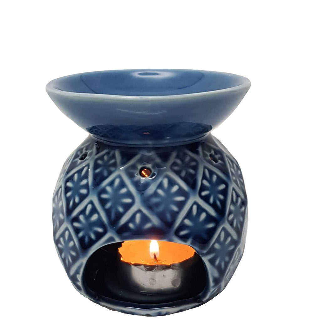 Twig-and-feather-oil-burner-with-petal-pattern-blue-retro-vintage