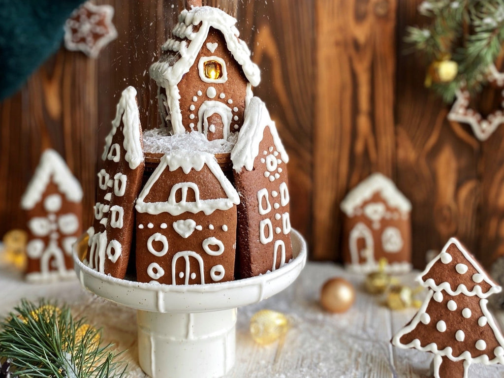 The Twig and Feather Gingerbread House Palm Wax Candle collection - image shows gingerbread shaped as houses and trees