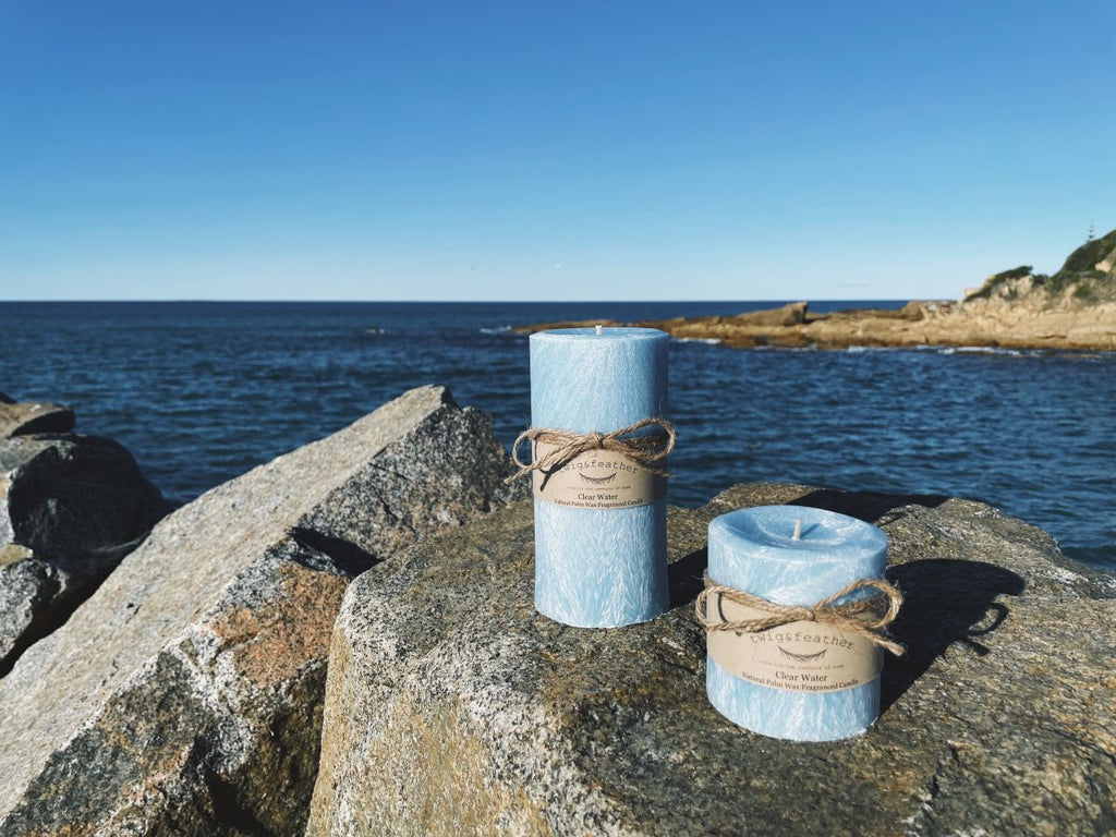 The Twig and Feather Clear Water Palm Wax Pillar Candle Collection