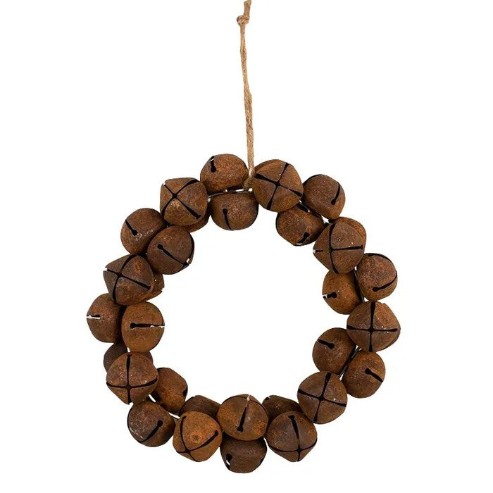 Wreath made of rusty bells on a white background