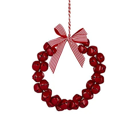 Red jingle bell wreath with a red and white striped bow on a white background