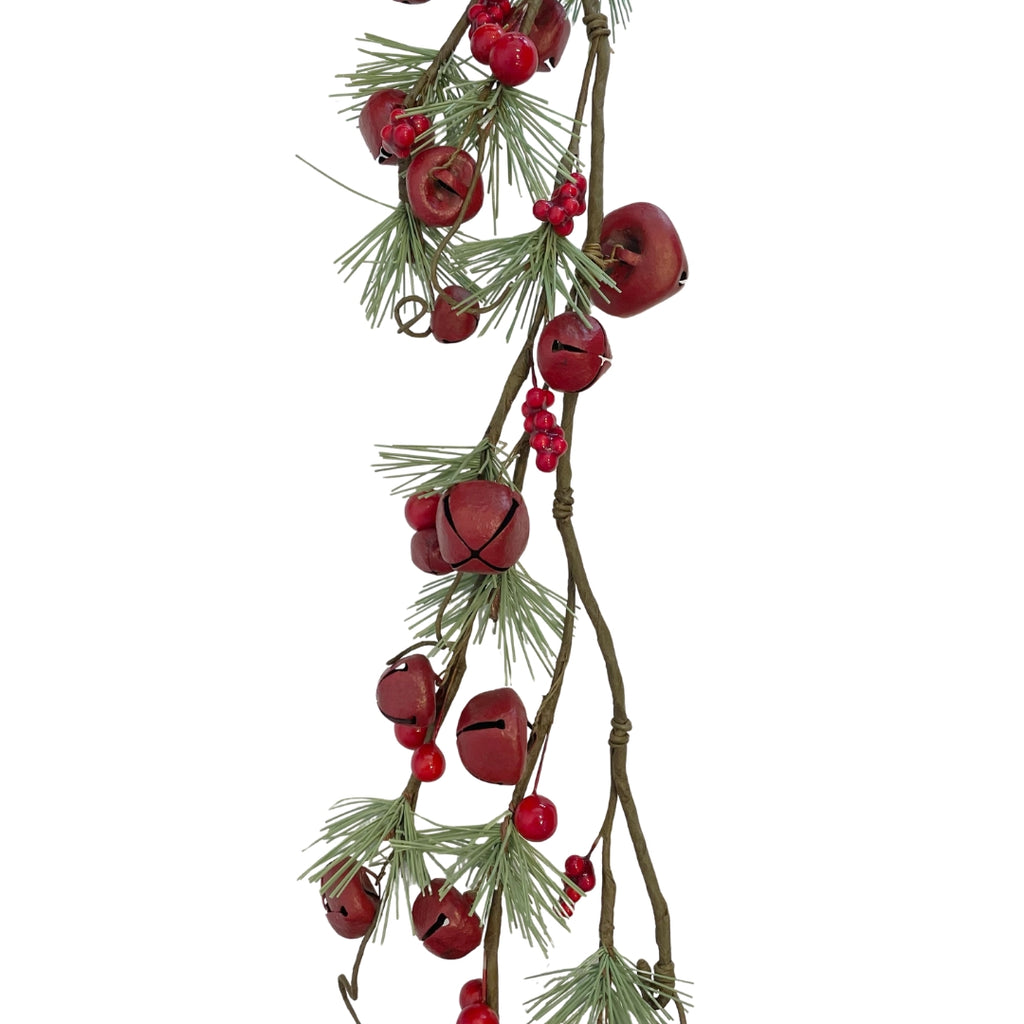 Decorative garland with red bells, red berries and green pine branches on a white background - detailed view