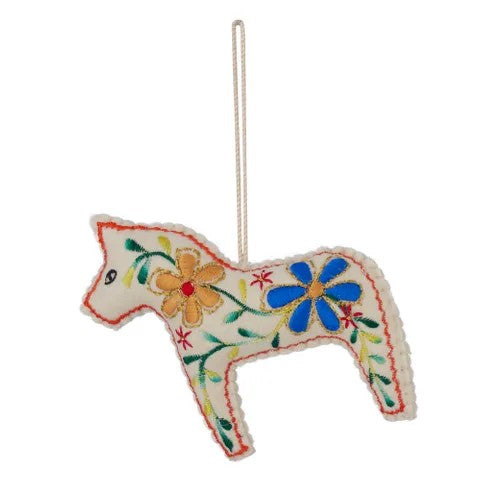 Decorative felt horse ornament with floral patterns on a white background