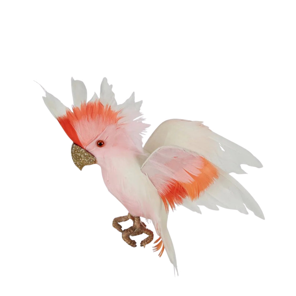 Major Mitchell cockatoo decoration with orange and white feathers hanging on a white background
