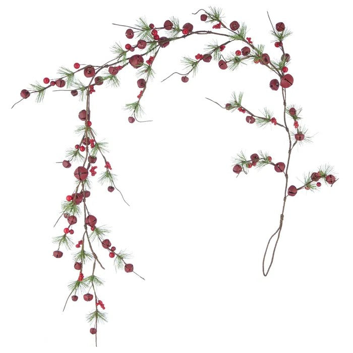 Decorative garland with red bells, red berries and green pine branches on a white background