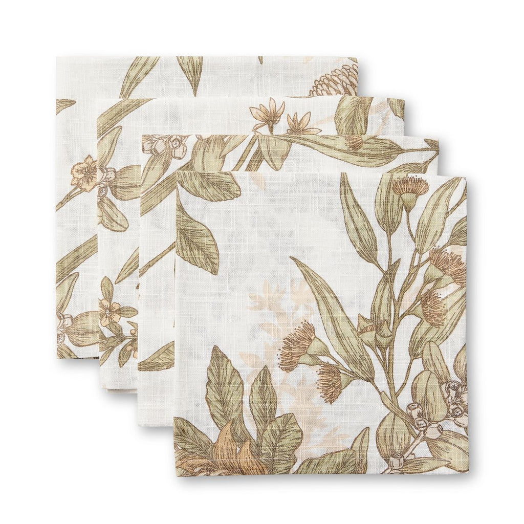 Set of four native floral-patterned napkins on a white background