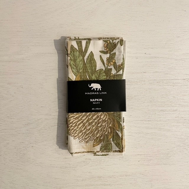 Packaged napkins with a native floral design on a neutral background