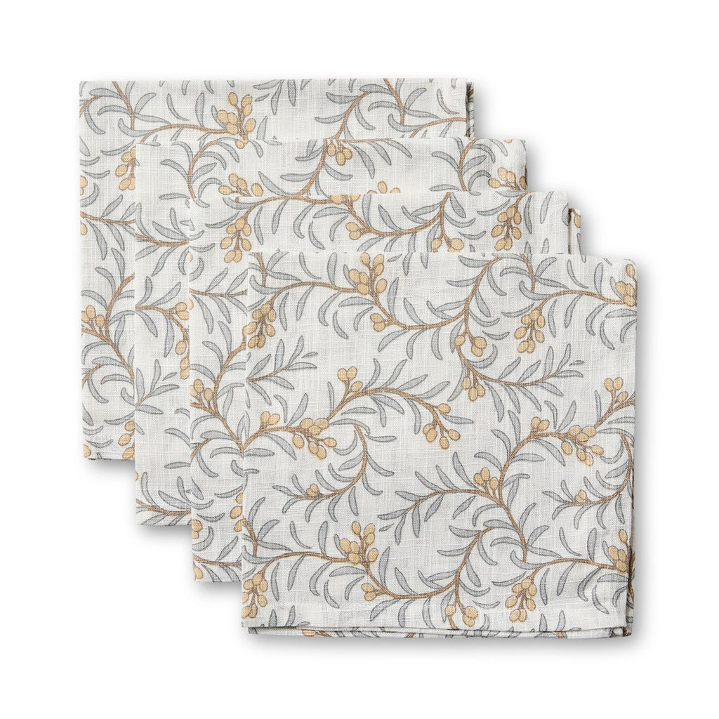 Set of four Juniper folded fabric napkins with a floral pattern in blue and apricot on a white background