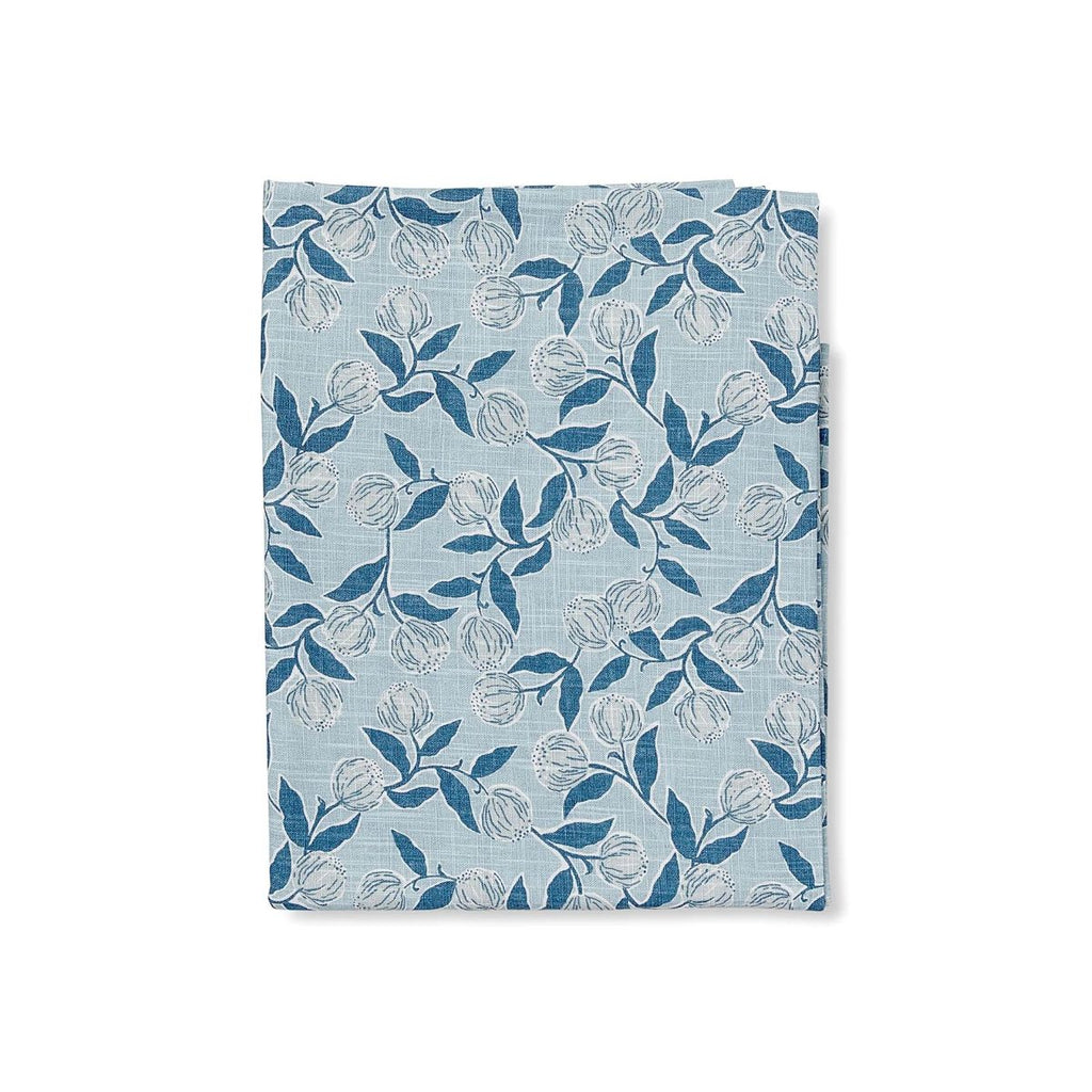 Twig and Feather: Blue Floral patterned fabric tablecloth folded on a white background