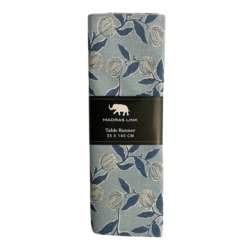 Twig and Feather- Packaged table runner with floral pattern and Madras Link branding on a white background