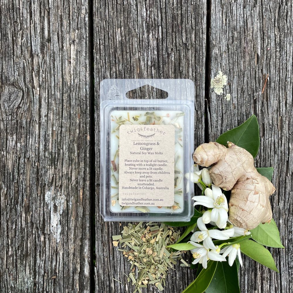 Twig and Feather - Soy Wax melt packaged with Fresh lemongrass and ginger on a wooden surface