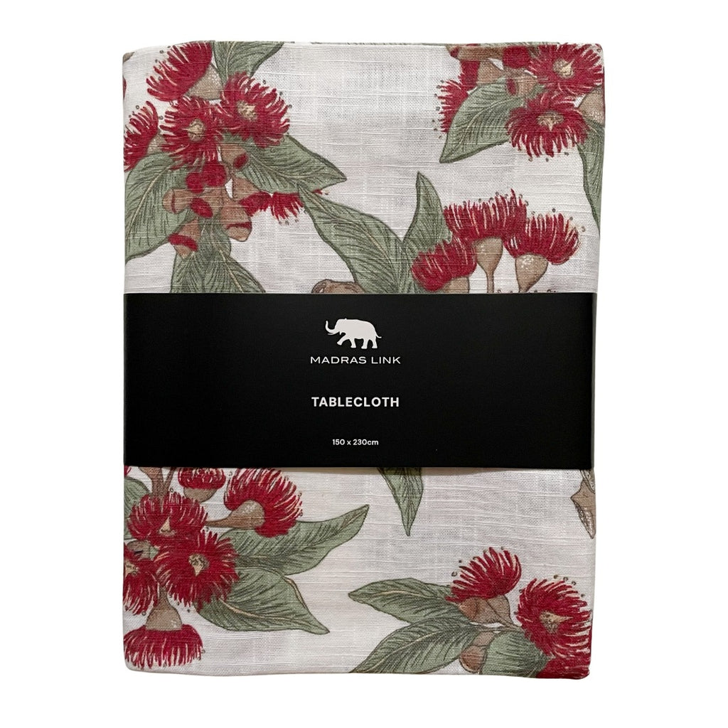 Packaged tablecloth with red flowering gum design and Madras Link branding.