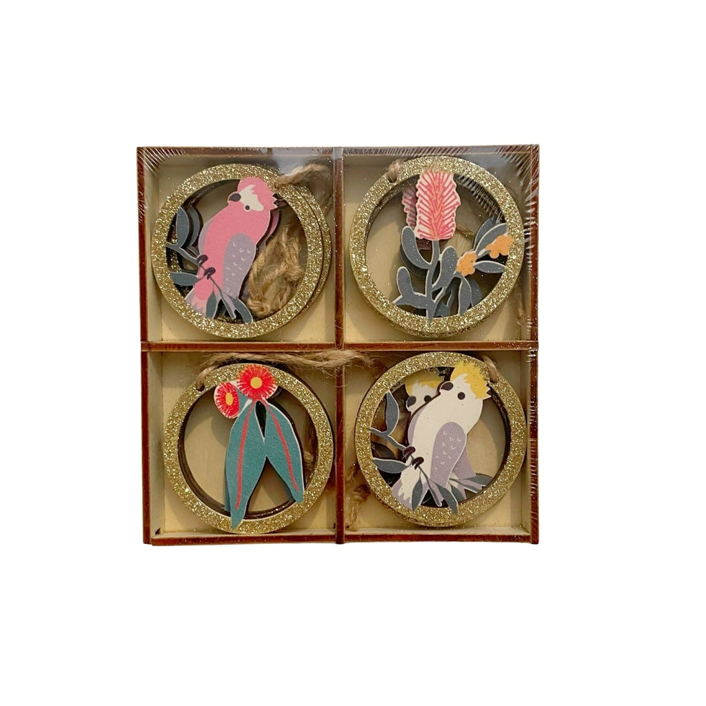 Set of 8 Australian Christmas  decorattions with birds and plants in a wooden box on a white background