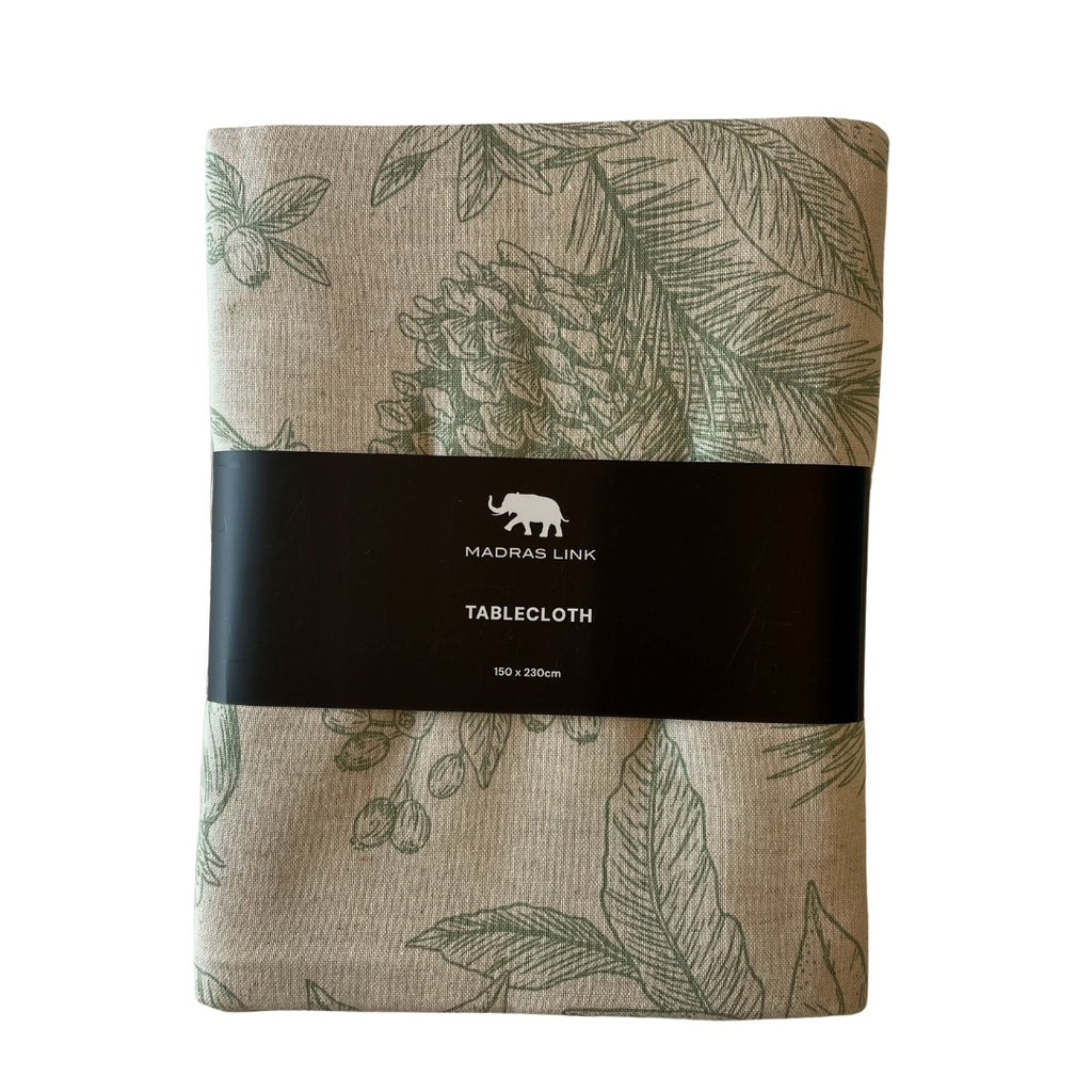 Packaged tablecloth with pomegranate and pine leaf pattern and Madras Link branding on a white background