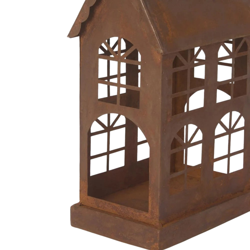 Rusty candle house or lantern with a white background - detailed view