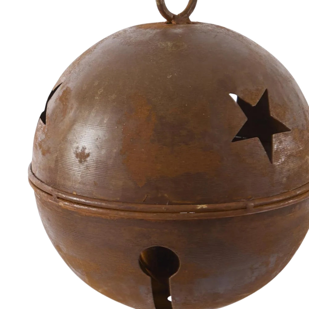Rusty bell with a star cutout on a white background - detail image