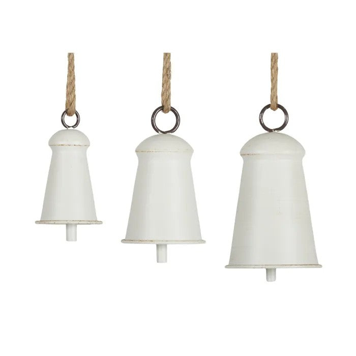 Three white hanging bells with ropes on a white background