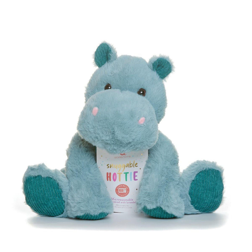 Blue plush snuggable hottie hippo toy with a label on a white background