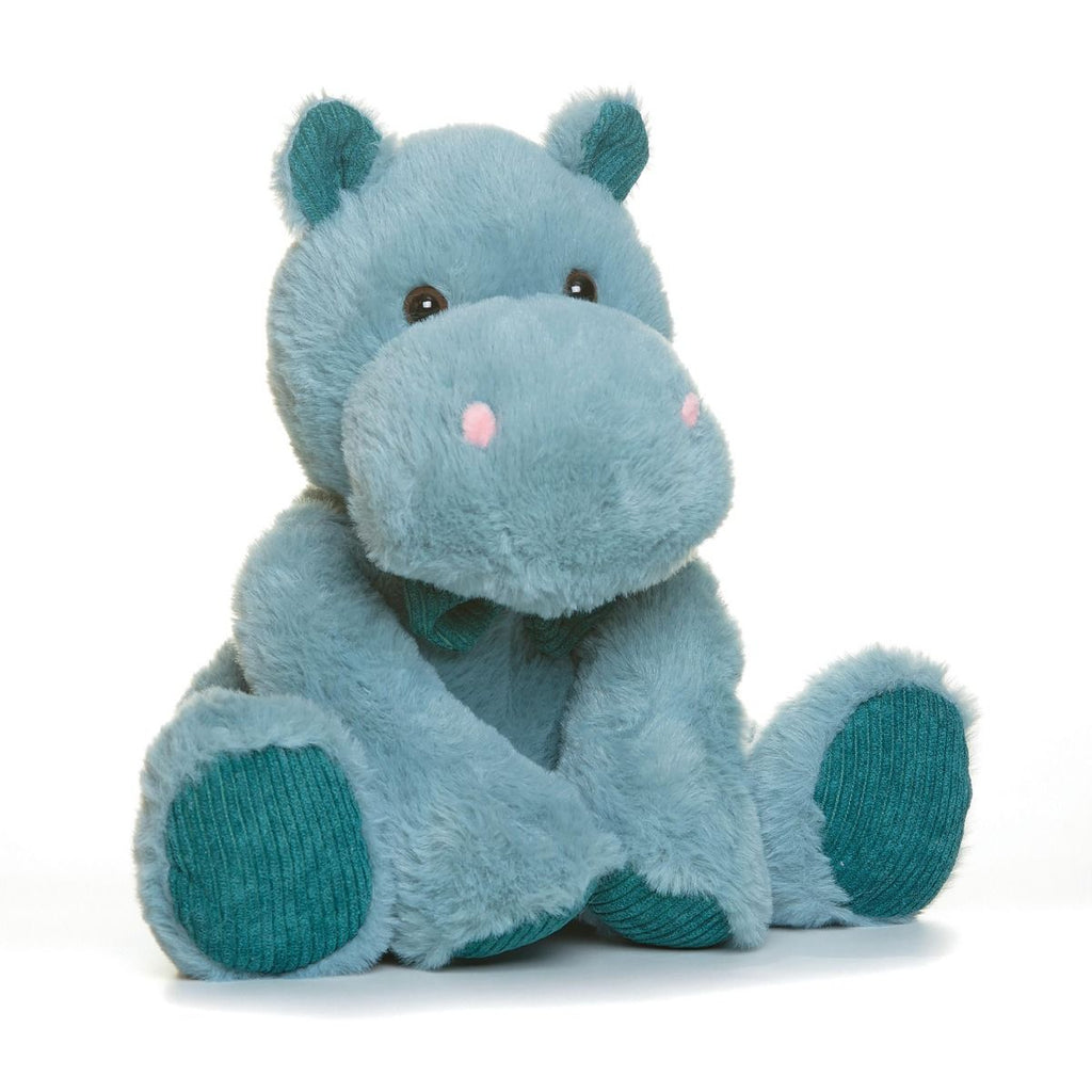 Blue plush snuggable hottie hippo toy on a white background