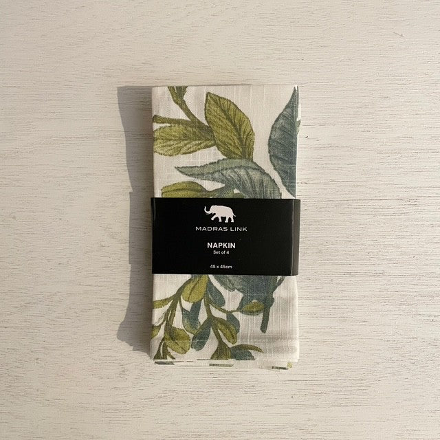 Twig and Feather: Packaged napkin with leaf pattern and Madras Link branding on a textured surface