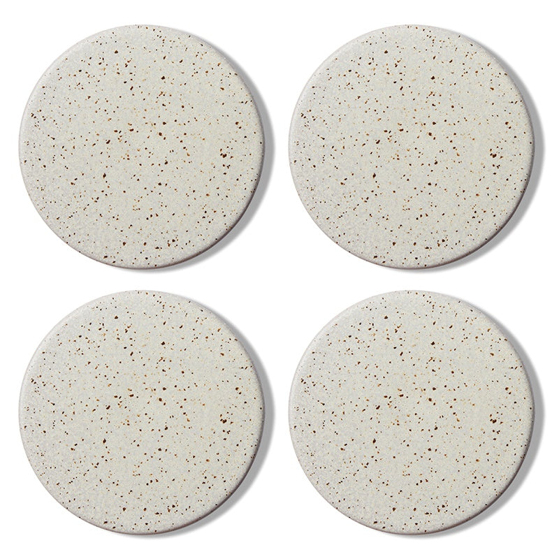 Twig and Feather - Ceramic coaster with a speckle finish in neutral stone colour  - set of 4 by Madras Link