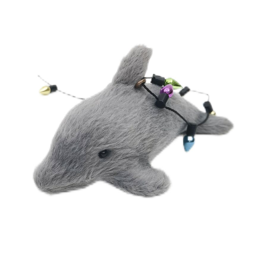 Gray dolphin hanging decoration with  lights on string on a white background