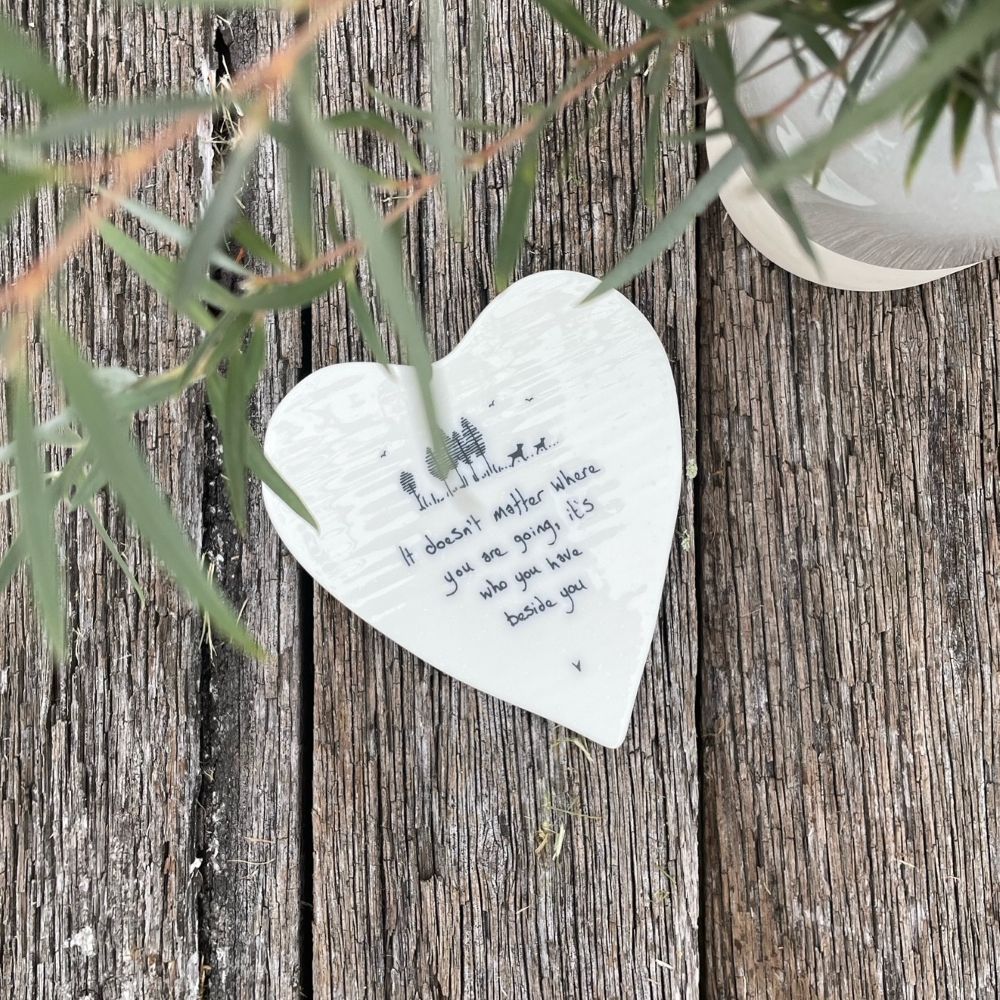Twig and Feather Porcelain Coaster saying It doesn't matter where you are going, it's who you have beside you