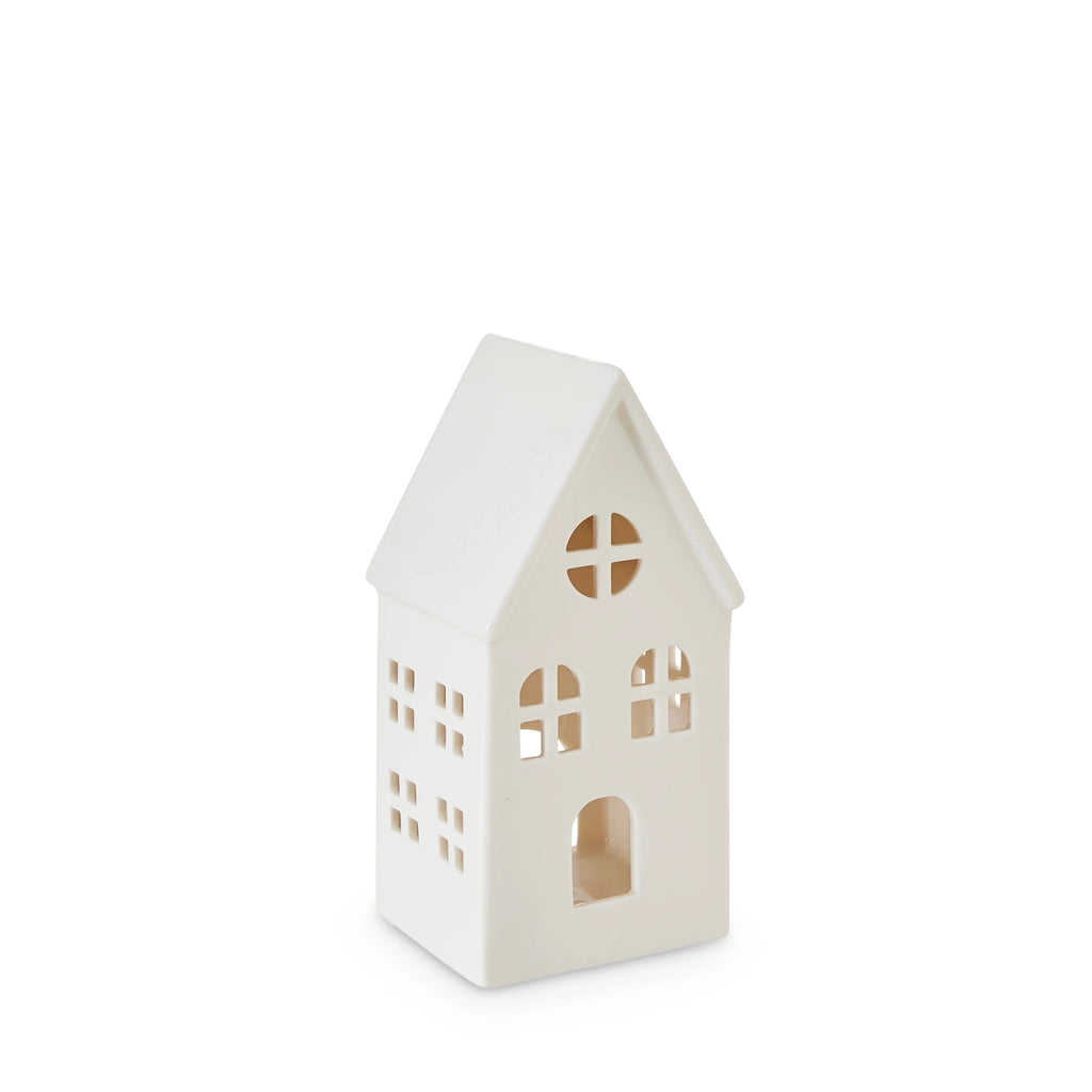 White Ceramic house-shaped table decoration on a white background