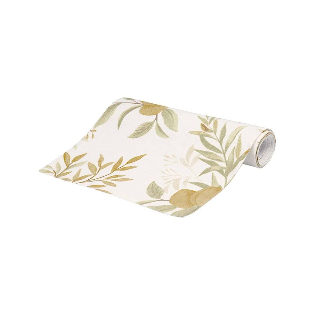 Roll of spring orchard table runner with fruit and leaf pattern on a white background
