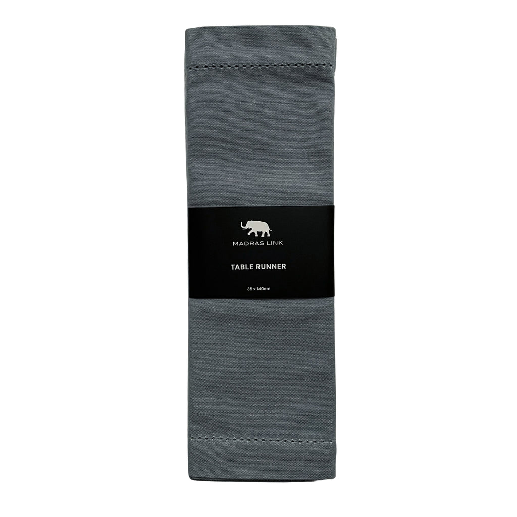 Mineral blue table runner with a black label on a white background