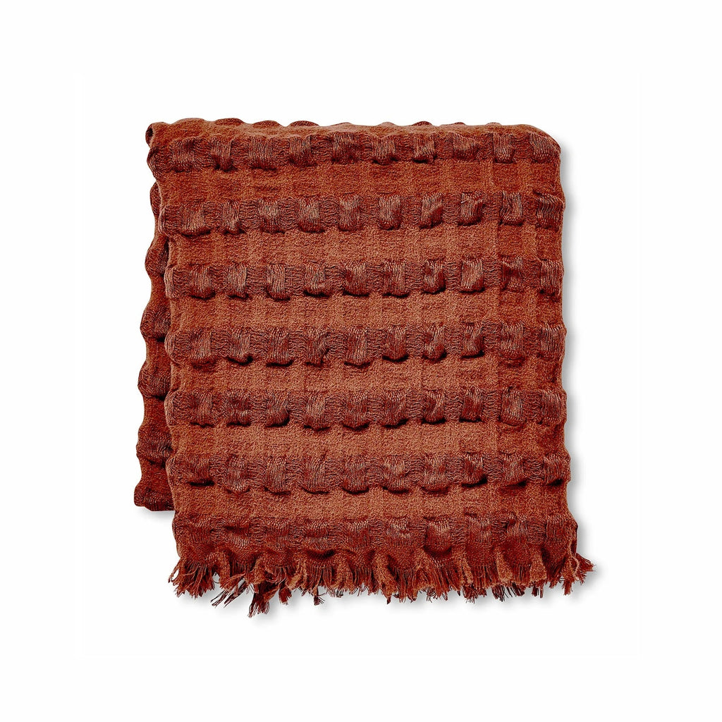 Twig and Feather waffle weave throw rug in rust by Madras Link