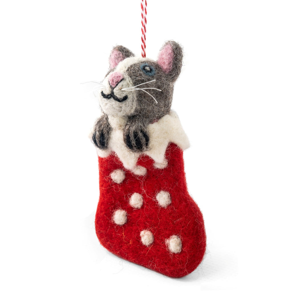 Felted cat ornament in a red stocking on a white background