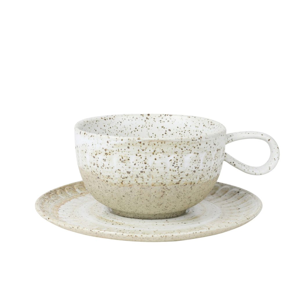 Twig and Feather - Celyon cup and saucer set with brown speckled glaze on white and taupe ceramic, and slight pattern indentation - by Robert Gordon