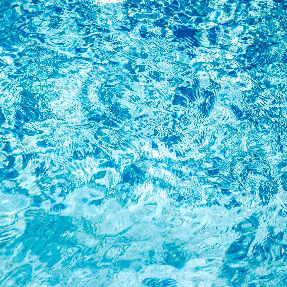 Clear blue water with ripples