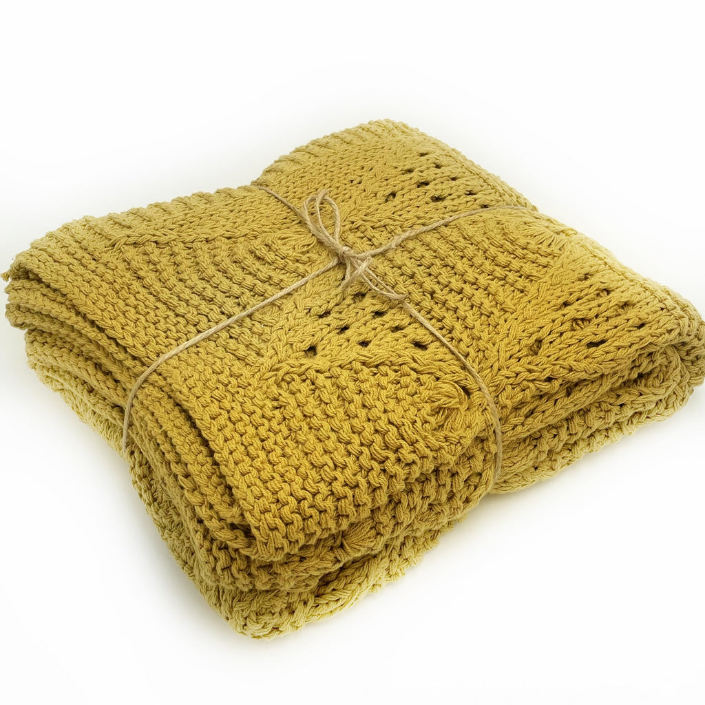 Twig-and-feather-hand-knit-throw-mustard